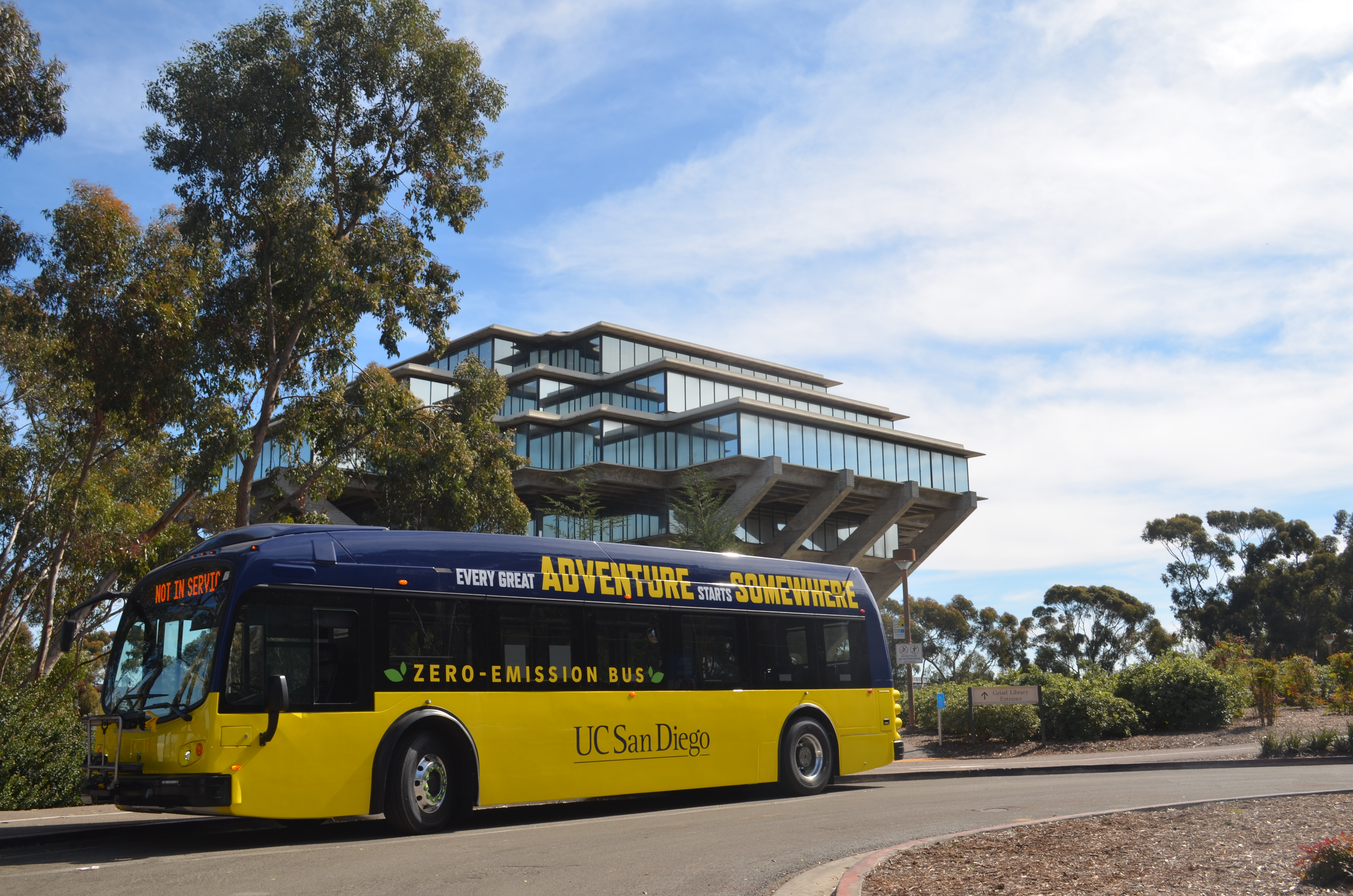 Triton Transit bus with Geisel Library in the background